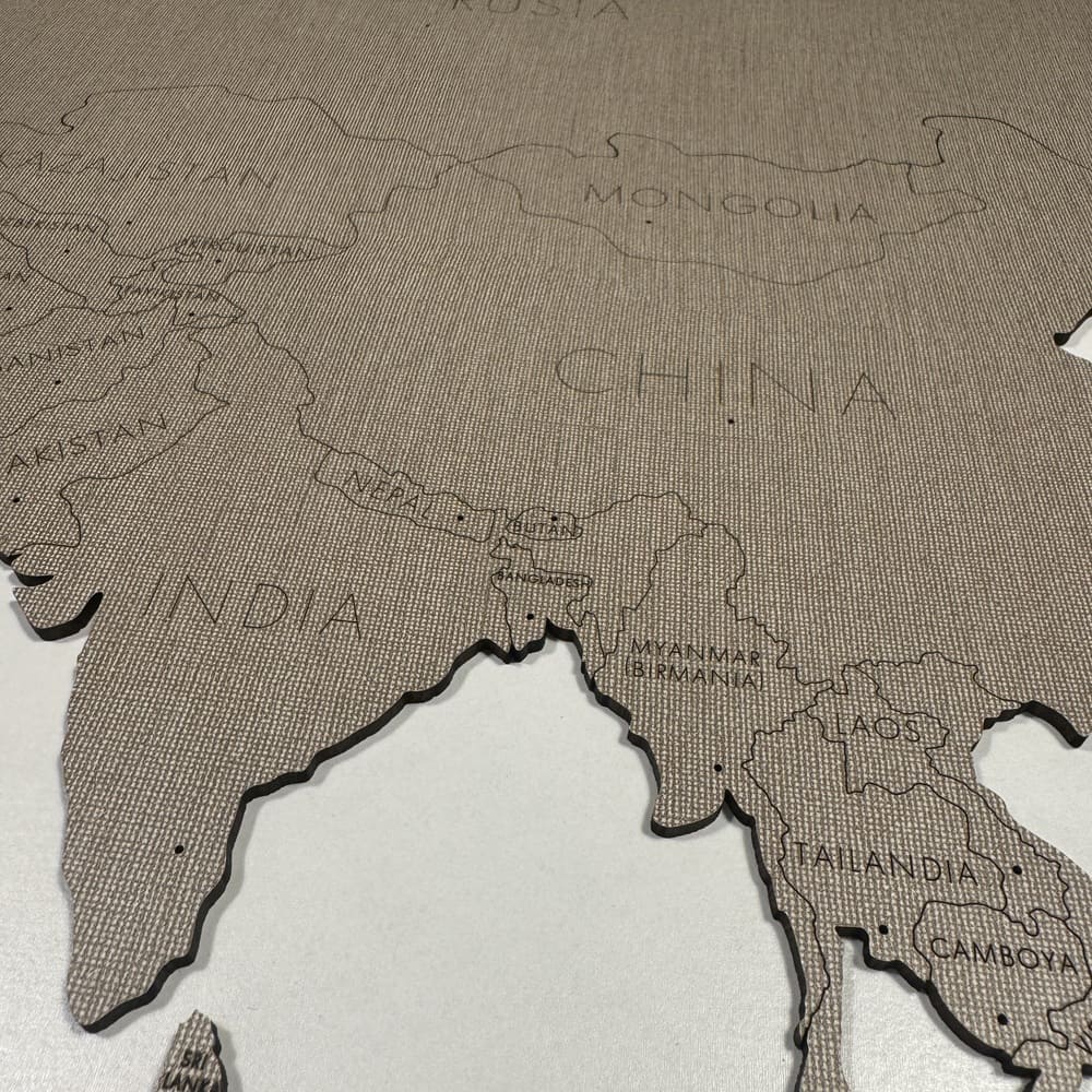 Mapamundi 2D de madera color gris (efecto textil)